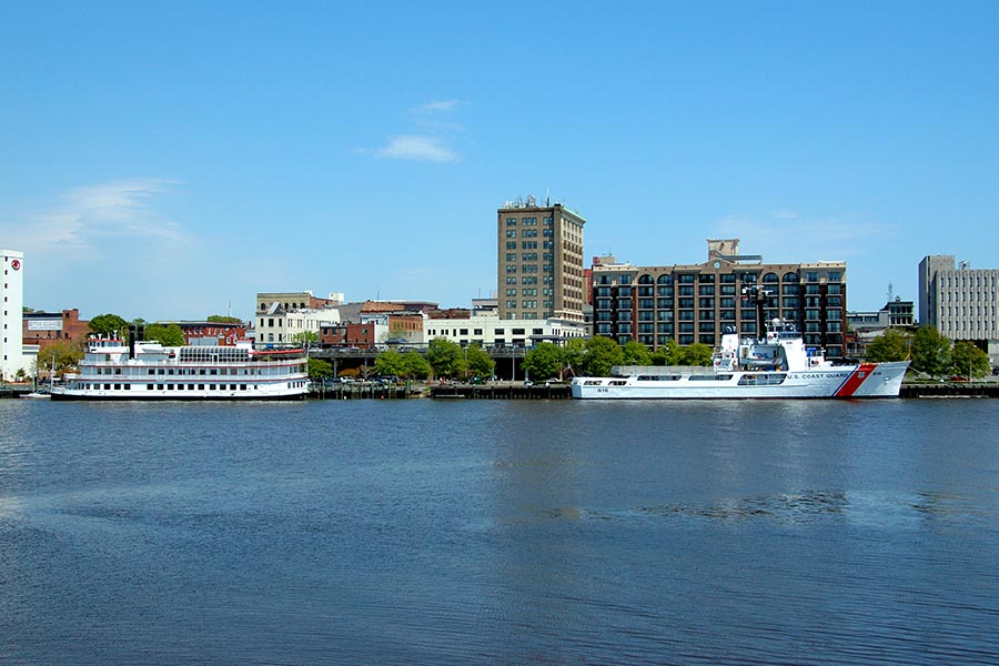 The Riverboat and Coast Guard cutter are docked on the Cape Fear River in Downtown Wilmington.